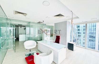 Office Space - Studio - 2 Bathrooms for rent in The Prism - Business Bay - Dubai