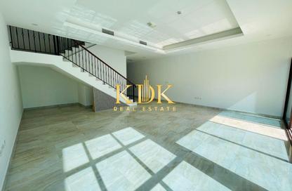 Villa - 3 - 4 for rent in District 14 - Jumeirah Village Circle - Dubai