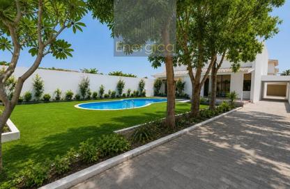 Villa - 4 Bedrooms - 5 Bathrooms for rent in Jumeirah 1 Villas - Jumeirah 1 - Jumeirah - Dubai