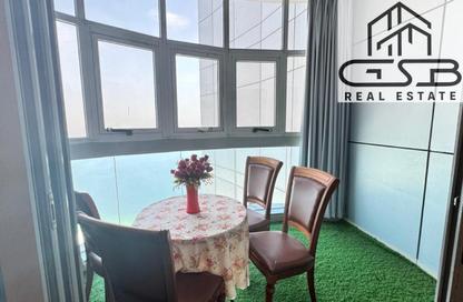Apartment - 2 Bedrooms - 3 Bathrooms for sale in Corniche Tower - Ajman Corniche Road - Ajman