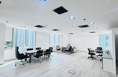 Office Space - Studio - 2 Bathrooms for rent in The Prism - Business Bay - Dubai