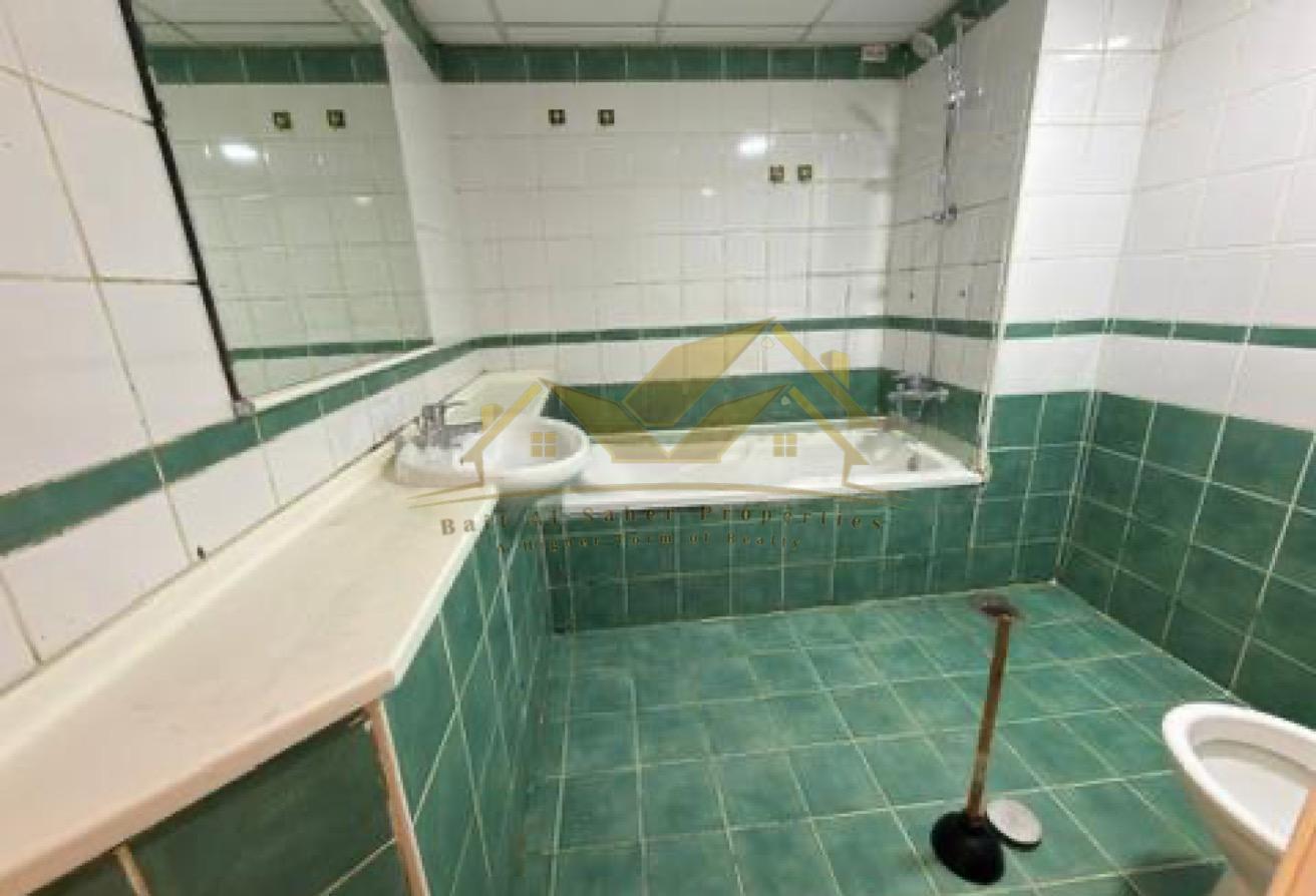 Unfurnished 1 BR Apartment in Al Raffa | Pool photo 9