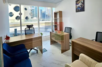 Business Centre - Studio - 2 Bathrooms for rent in The Bay View - Business Bay - Dubai