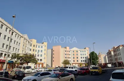 Shop - Studio for rent in Building X26 - England Cluster - International City - Dubai