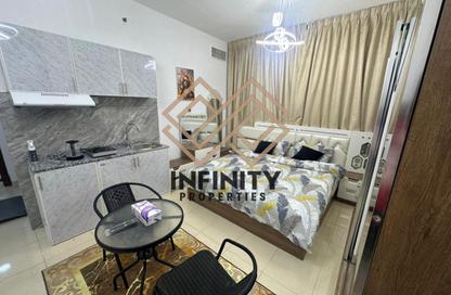 Apartment - 2 Bedrooms - 3 Bathrooms for sale in Orient Tower 1 - Orient Towers - Al Bustan - Ajman