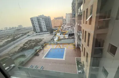 Apartment - Studio - 1 Bathroom for rent in Silicon Gates 4 - Silicon Gates - Dubai Silicon Oasis - Dubai