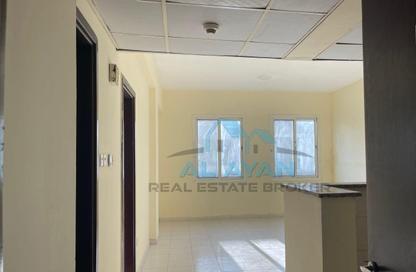 شقة - غرفة نوم - 2 حمامات للايجار في L03 - طراز يوناني - المدينة العالمية - دبي شقة - غرفة نوم - 2 حمامات للايجار في L03 - طراز يوناني - المدينة العالمية - دبي