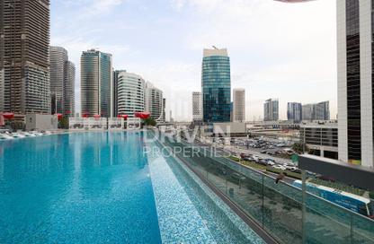 Apartment - 1 - 1 for sale in MAG 318 - Business Bay - Dubai