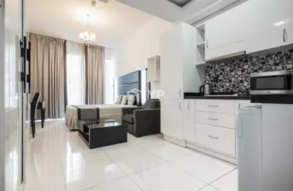 شقة - 1 حمام للايجار في جيوفاني بوتيك سويتس - مدينة دبي الرياضية - دبي