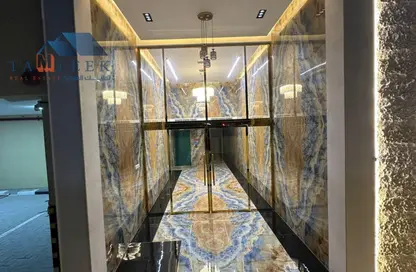 عمارة بالكامل - استوديو - 8 حمامات للبيع في 3 المويهات - المويهات - عجمان