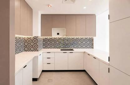 Apartment - 1 - 2 for sale in The Community - Motor City - Dubai