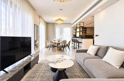 Villa - 4 - 5 for rent in Aura Gardens - Tilal Al Ghaf - Dubai