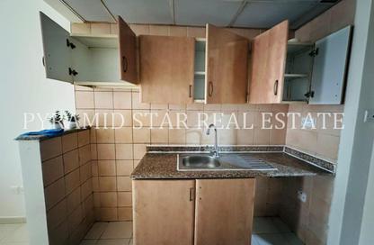 Apartment - Studio - 1 Bathroom for rent in Building X11 - England Cluster - International City - Dubai