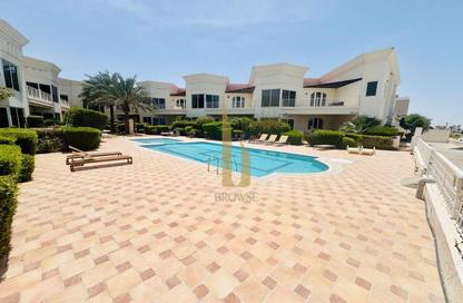 Villa - 4 Bedrooms - 4 Bathrooms for rent in Jumeirah 1 Villas - Jumeirah 1 - Jumeirah - Dubai
