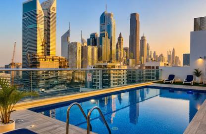 Apartment - 1 - 1 for rent in Jumeirah Garden City - Al Satwa - Dubai