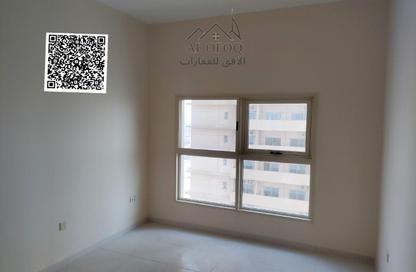 Apartment - 1 Bedroom - 2 Bathrooms for sale in Lilies Tower - Emirates City - Ajman
