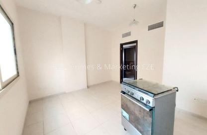 Apartment - 1 - 1 for rent in Al Butina 9 Building - Bu Tina - Al Sharq - Sharjah