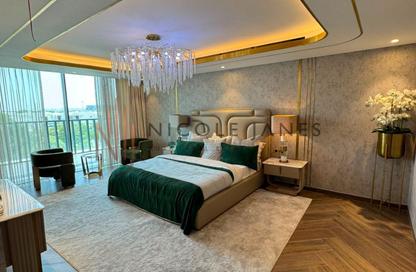 Apartment - 2 Bedrooms - 2 Bathrooms for sale in Cavalli Casa Tower - Dubai Media City - Dubai