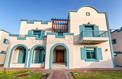 Villa - 5 Bedrooms - 7 Bathrooms for sale in Western Residence South - Falcon City of Wonders - Dubai