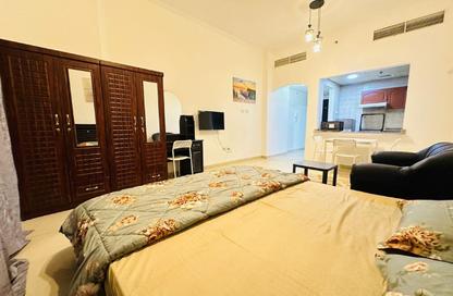 شقة - غرفة نوم - 1 حمام للايجار في برج ترافلغار - منطقة مركز الأعمال - المدينة العالمية - دبي
