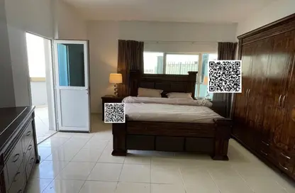 شقة - غرفة نوم - 2 حمامات للايجار في أورينت تاور 1 - أورينت تاور - البستان - عجمان