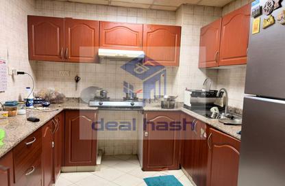 Apartment - 1 - 1 for sale in Trafalgar Tower - CBD (Central Business District) - International City - Dubai