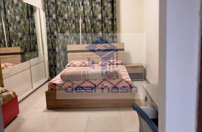 Apartment - 1 - 1 for sale in Trafalgar Tower - CBD (Central Business District) - International City - Dubai