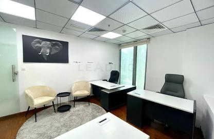 Business Centre - Studio - 3 Bathrooms for rent in Iris Bay - Business Bay - Dubai