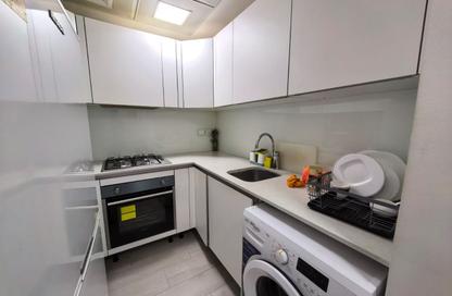Apartment - 1 - 2 for sale in Easy 19 - International City Phase 2 (Al Warsan 4) - Dubai
