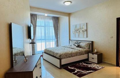 Apartment - 1 Bedroom - 2 Bathrooms for rent in Corniche Tower - Ajman Corniche Road - Ajman