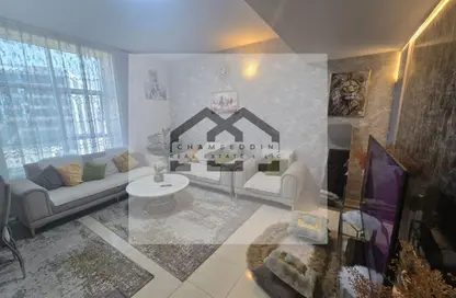 Apartment - 1 Bedroom - 2 Bathrooms for sale in Orient Tower 1 - Orient Towers - Al Bustan - Ajman