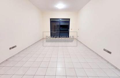 Apartment - 1 Bedroom - 2 Bathrooms for rent in Dunes Village Building 10 - Dunes Village - Dubai Investment Park (DIP) - Dubai