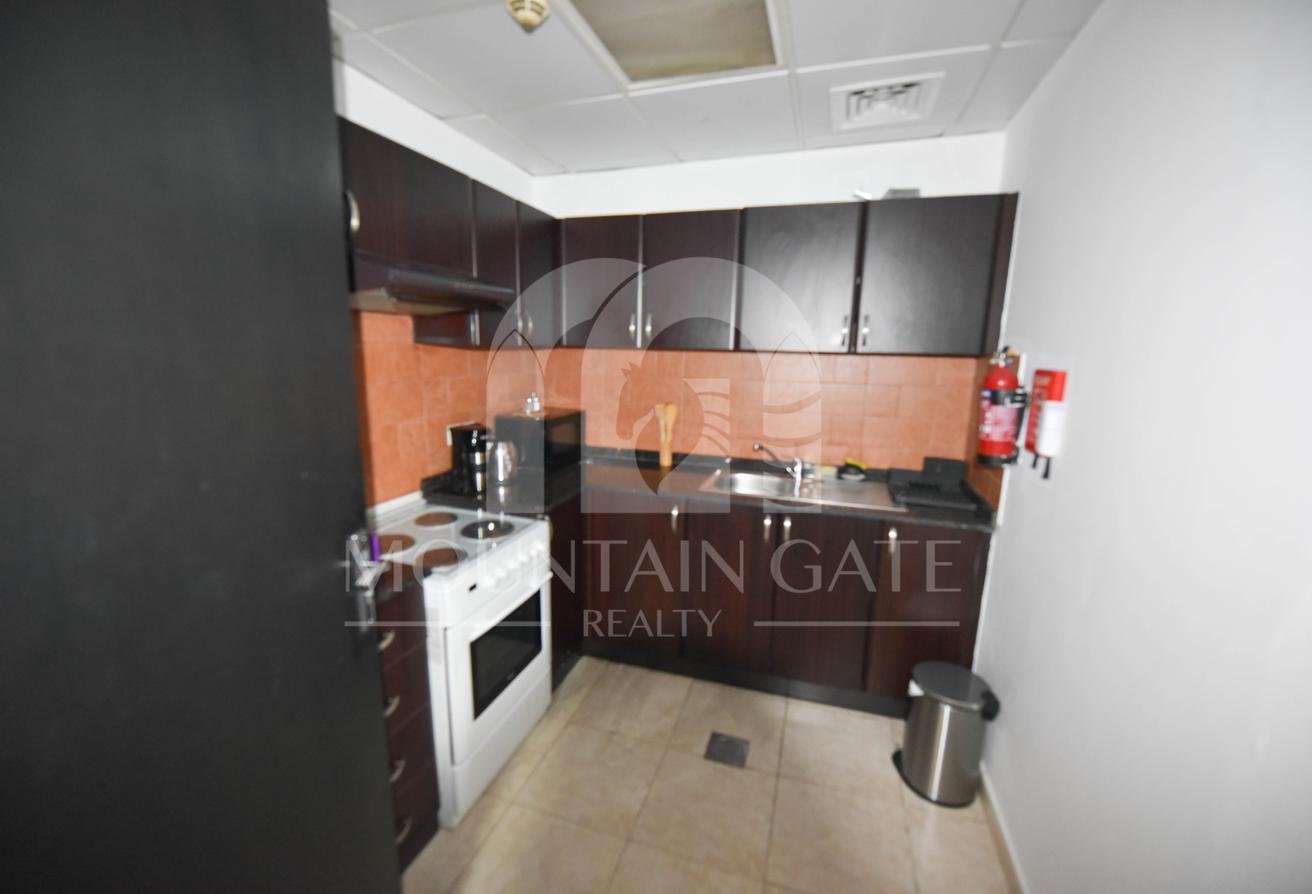 Fully Furnished Closed Kitchen Pool View in JVC photo 4