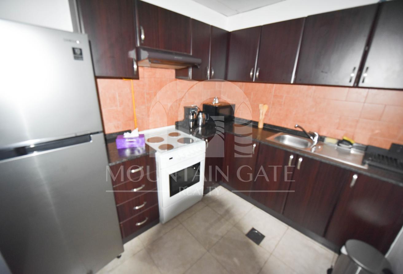 Fully Furnished Closed Kitchen Pool View in JVC photo 5