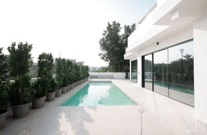 Villa - 5 Bedrooms - 6 Bathrooms for sale in Wildflower - Jumeirah Golf Estates - Dubai