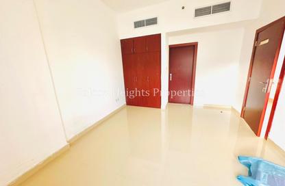 Apartment - 1 Bedroom - 2 Bathrooms for rent in Al Jawaher Building - International City Phase 2 - Al Warsan 4 - Al Warsan - Dubai