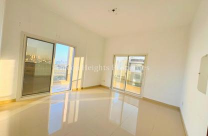 Apartment - 1 Bedroom - 2 Bathrooms for rent in Al Jawaher Building - International City Phase 2 - Al Warsan 4 - Al Warsan - Dubai