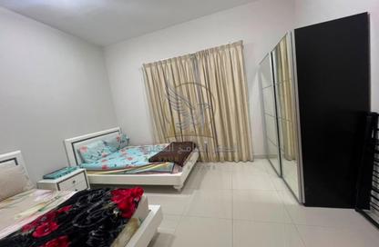 Apartment - 2 Bedrooms - 2 Bathrooms for rent in SRS Tower - Al Rashidiya 1 - Al Rashidiya - Ajman