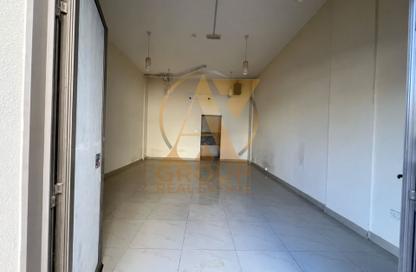 Shop - Studio for rent in Building V02 - Russia Cluster - International City - Dubai