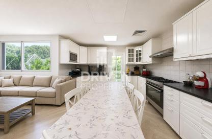 Villa - 5 - 6 for sale in Western Residence North - Falcon City of Wonders - Dubai