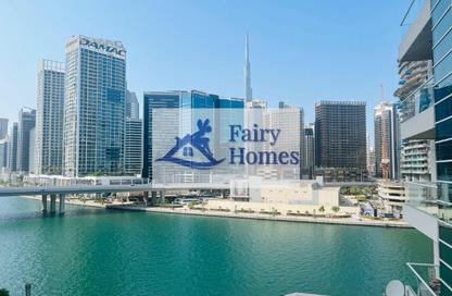 Apartment - 1 - 1 for rent in Mayfair Tower - Business Bay - Dubai