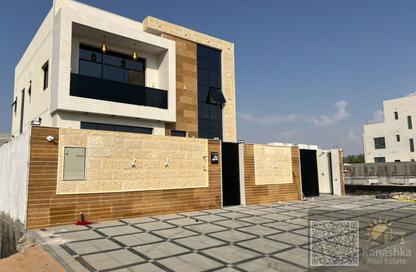 Villa - 4 - 5 for sale in Al Helio - Ajman