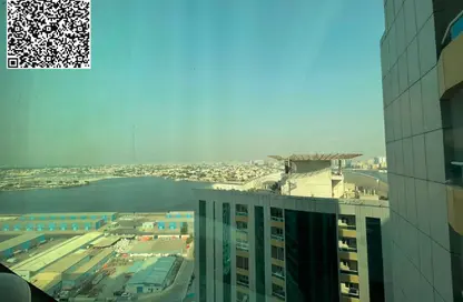 شقة - غرفة نوم - 2 حمامات للايجار في أورينت تاور 1 - أورينت تاور - البستان - عجمان