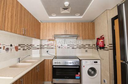 Apartment - 1 - 2 for rent in Continents Tower - District 13 - Jumeirah Village Circle - Dubai