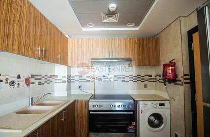 Apartment - 1 - 2 for rent in Continents Tower - District 13 - Jumeirah Village Circle - Dubai