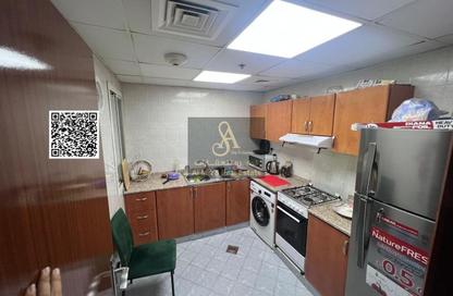 Apartment - 1 Bedroom - 2 Bathrooms for sale in Orient Tower 1 - Orient Towers - Al Bustan - Ajman