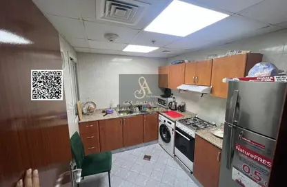 شقة - غرفة نوم - 2 حمامات للبيع في أورينت تاور 1 - أورينت تاور - البستان - عجمان