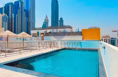 Apartment - 1 Bedroom - 2 Bathrooms for rent in Jumeirah Garden City - Al Satwa - Dubai