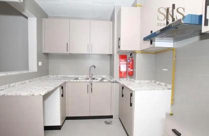 Apartment - 1 - 2 for rent in Rose Residences 2 - Al Furjan - Dubai