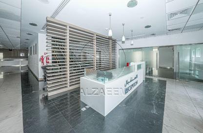 Show Room - Studio - 4 Bathrooms for rent in Tourist Club Area - Abu Dhabi